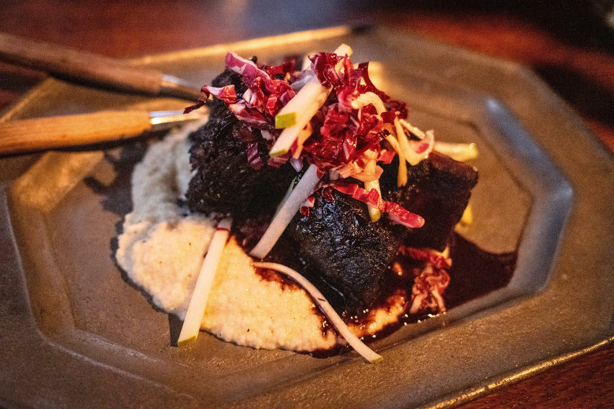 Braised Short Ribs with Celery Root Puree and Pear & Radicchio Slaw