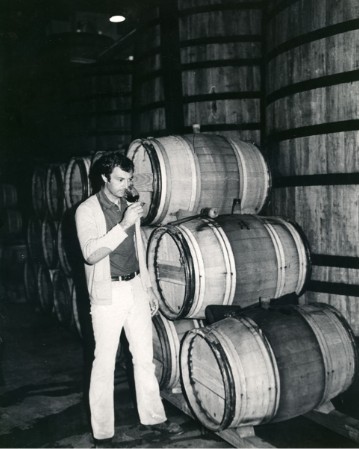 Clos du Val Timeline - 1970 - Bernard Portet near wine barrels